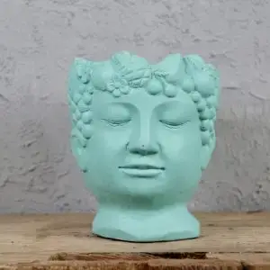 Květináč Hlava tmavo svetlo modrý Ø 9 cm