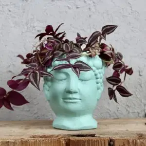 Květináč Hlava tmavo svetlo modrý Ø 9 cm